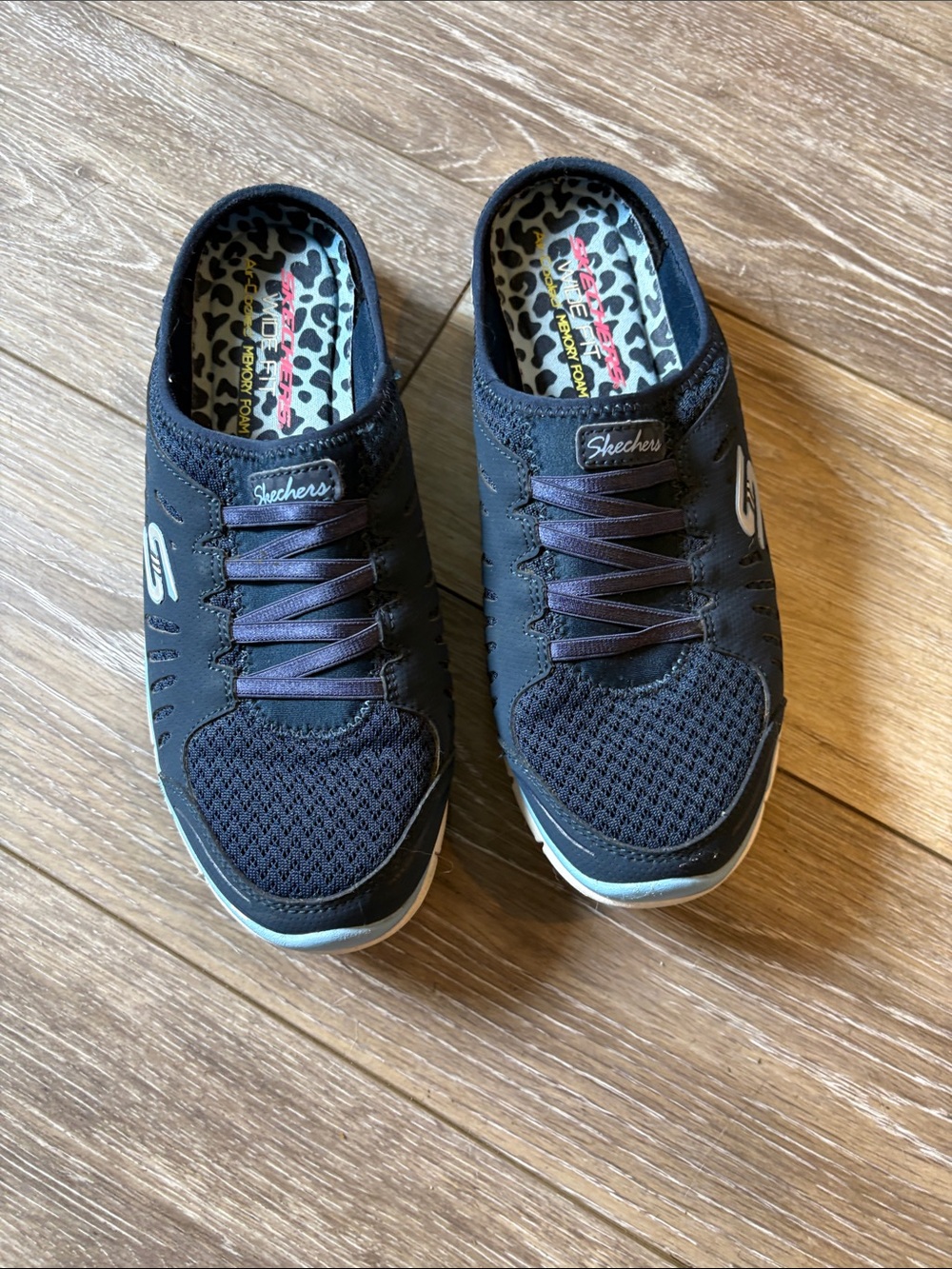 Skechers Black Slip-On Mesh Sneakers with Light Blue Accent